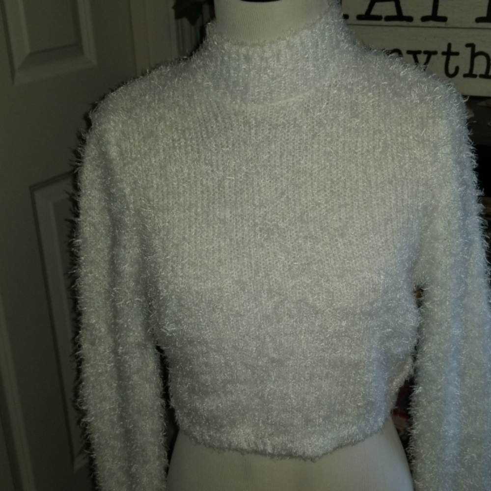 White, fuzzy sweater